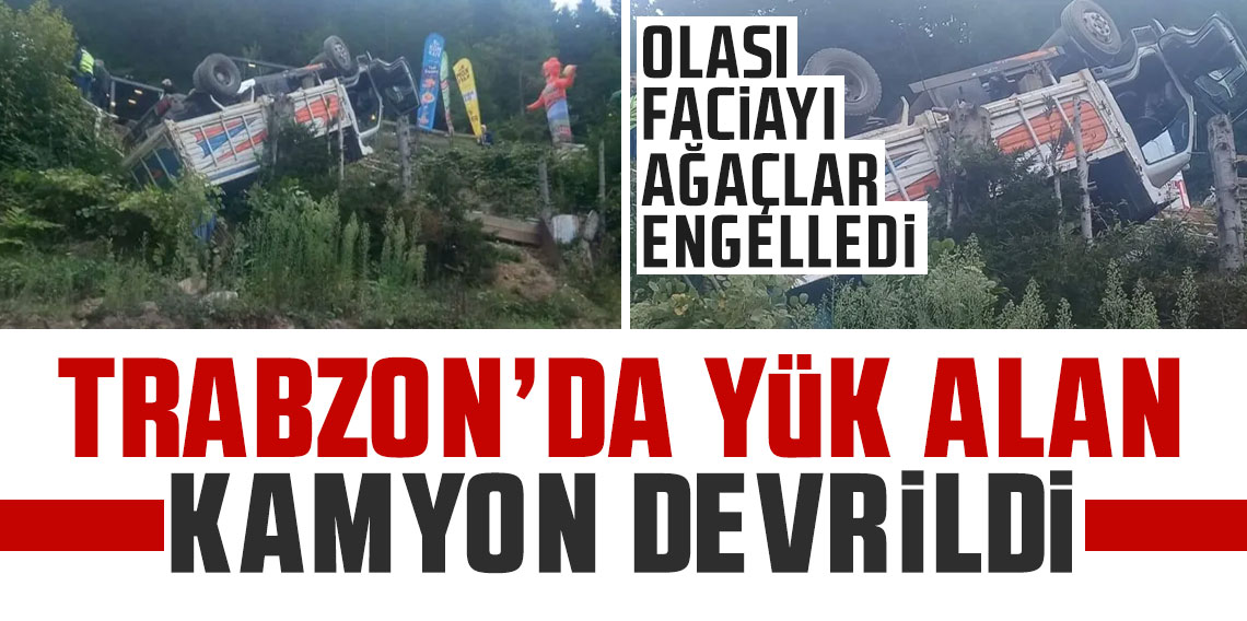 Trabzon'da yük alan kamyon devrildi! Olası faciayı ağaçlar engelledi
